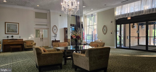 6100 Westchester Park Dr Unit 520, College Park, MD 20740 - building lobby with ornamental molding, a high ceiling, a textured ceiling, and recessed lighting