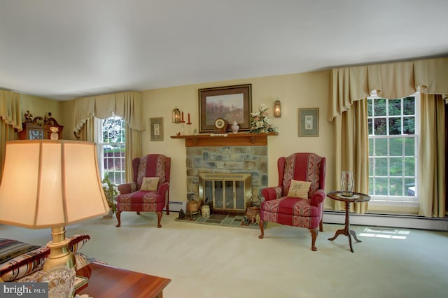 11733 Woodlea Dr, Waynesboro, PA 17268 - sitting room featuring healthy amount of natural light, carpet floors, a baseboard heating unit, and a stone fireplace