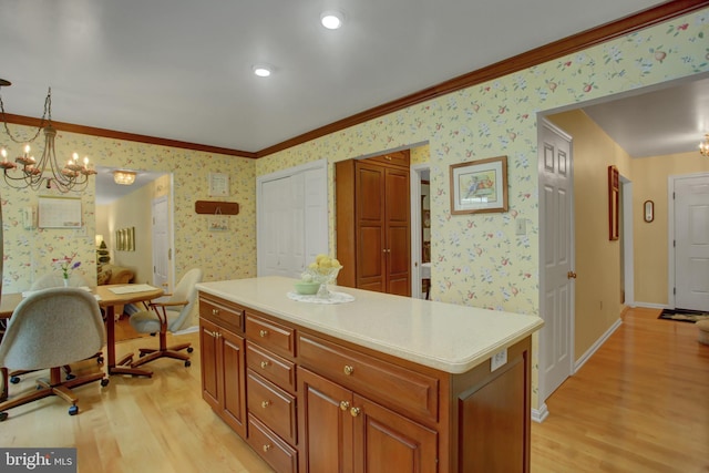 11733 Woodlea Dr, Waynesboro, PA 17268 - kitchen with wallpapered walls, light wood-style floors, a chandelier, brown cabinetry, and light countertops