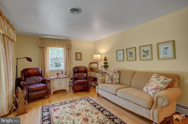 11733 Woodlea Dr, Waynesboro, PA 17268 - living area with light wood-style floors and baseboard heating