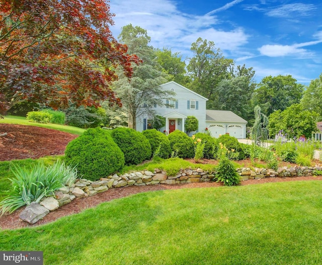 11733 Woodlea Dr, Waynesboro, PA 17268 - view of front facade with a garage and a front lawn