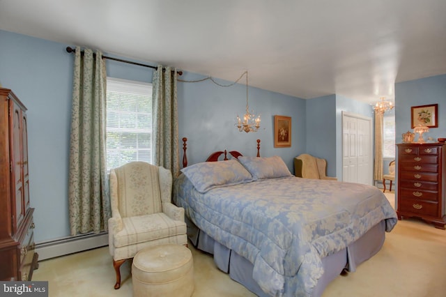 11733 Woodlea Dr, Waynesboro, PA 17268 - bedroom featuring a chandelier, baseboard heating, a closet, and light colored carpet
