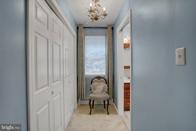 11733 Woodlea Dr, Waynesboro, PA 17268 - hall featuring light colored carpet, a chandelier, and a baseboard heating unit