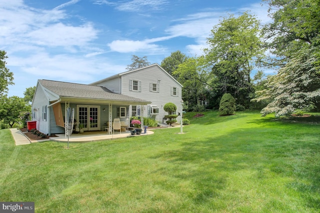 11733 Woodlea Dr, Waynesboro, PA 17268 - rear view of house with french doors, a yard, a patio area, and roof with shingles