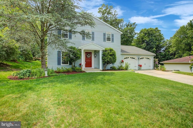 11733 Woodlea Dr, Waynesboro, PA 17268 - view of front of property featuring a garage, driveway, and a front lawn