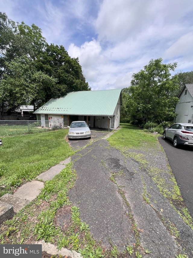2151 Spinnerstown Rd, Quakertown, PA 18951 - view of front of home featuring a metal roof and driveway