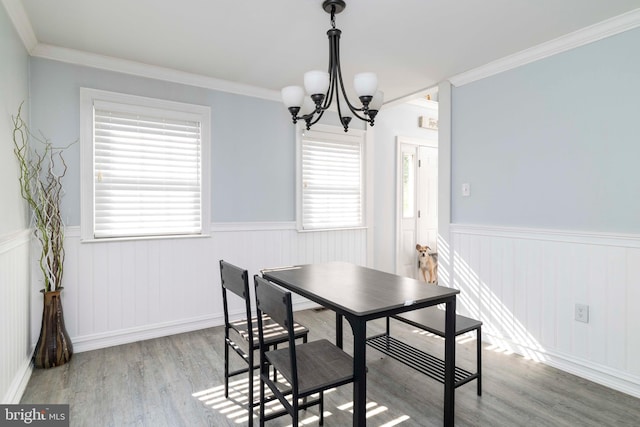 5960 Captain Milton E Major Ave, Bensalem, PA 19020 - dining room featuring wainscoting, a chandelier, wood finished floors, healthy amount of natural light, and ornamental molding
