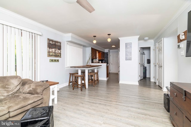 5960 Captain Milton E Major Ave, Bensalem, PA 19020 - living area with light wood-style flooring and crown molding
