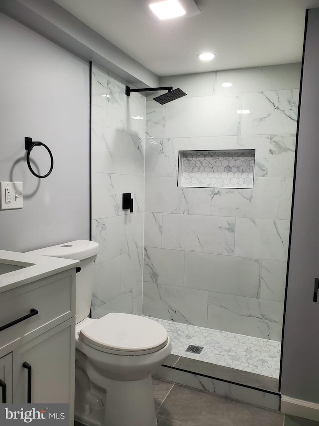 2011 Englewood Ave, Baltimore, MD 21207 - bathroom featuring vanity and a marble finish shower