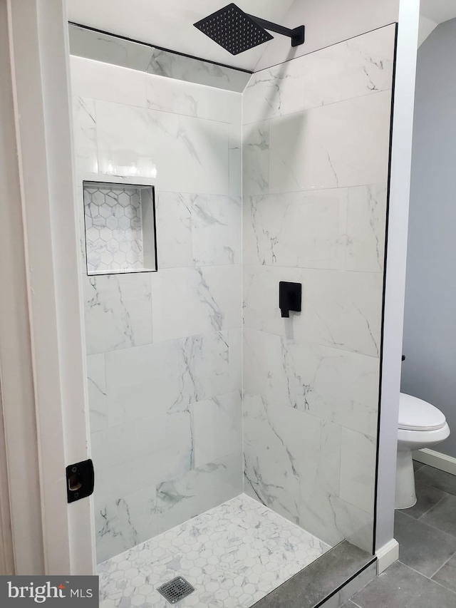 2011 Englewood Ave, Baltimore, MD 21207 - bathroom featuring toilet and a tile shower