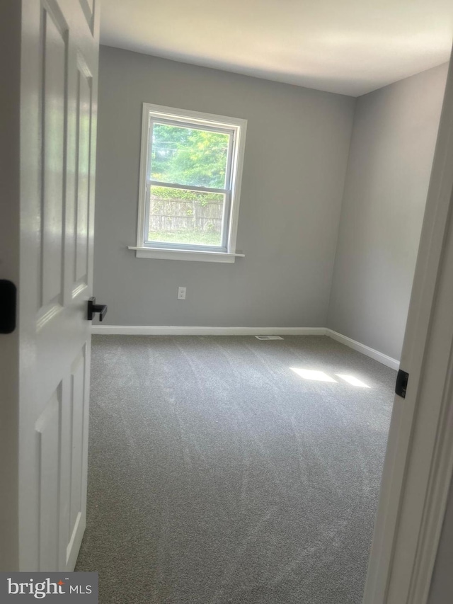 2011 Englewood Ave, Baltimore, MD 21207 - carpeted spare room featuring baseboards
