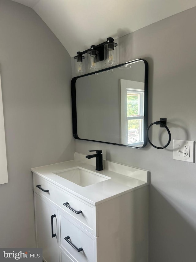 2011 Englewood Ave, Baltimore, MD 21207 - bathroom with vanity and vaulted ceiling