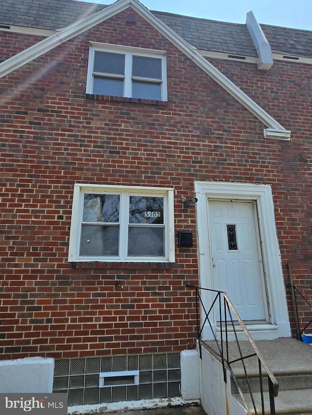 5903 Algon Ave, Philadelphia, PA 19149 - property entrance featuring brick siding