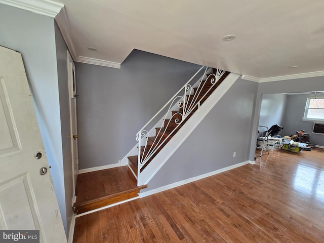 5903 Algon Ave, Philadelphia, PA 19149 - stairway with crown molding and wood finished floors