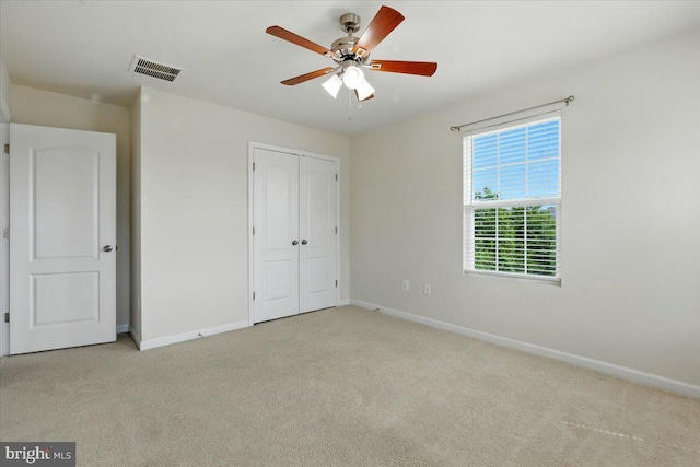7003 Dannfield Ct, Glen Burnie, MD 21060 - unfurnished bedroom featuring carpet, a closet, and a ceiling fan
