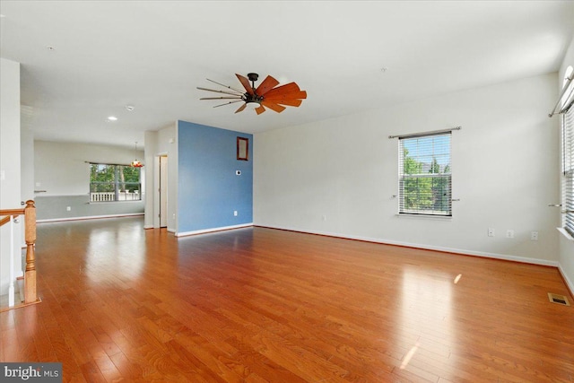 7003 Dannfield Ct, Glen Burnie, MD 21060 - spare room with wood finished floors and a ceiling fan