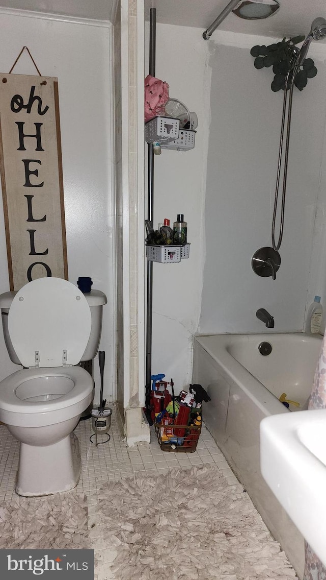 2618 E Biddle St, Baltimore, MD 21213 - bathroom featuring shower / washtub combination and toilet