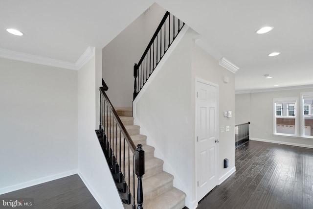 42510 Oak Park Sq, Ashburn, VA 20148 - stairway featuring ornamental molding, wood finished floors, and recessed lighting