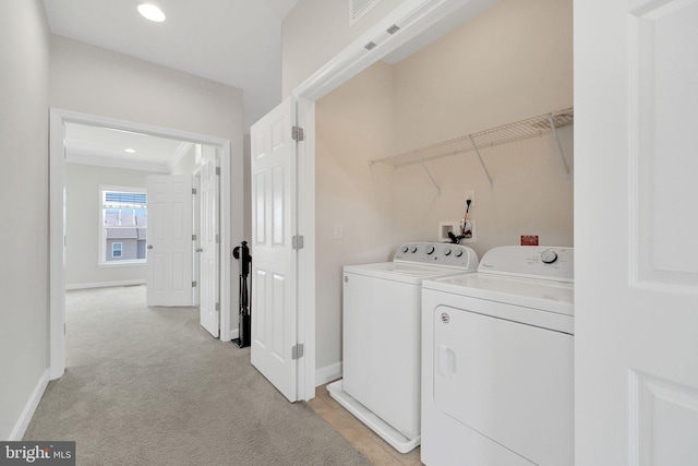 42510 Oak Park Sq, Ashburn, VA 20148 - laundry room with washer and dryer, light carpet, and recessed lighting