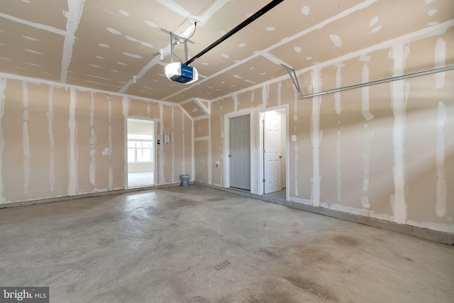 42510 Oak Park Sq, Ashburn, VA 20148 - garage featuring a garage door opener
