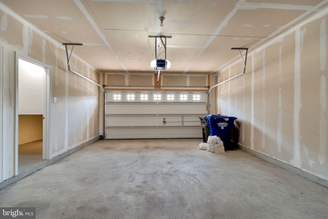 42510 Oak Park Sq, Ashburn, VA 20148 - garage featuring a garage door opener