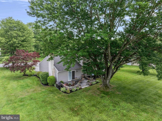 125 Christine Dr, Downingtown, PA 19335 - view of green lawn with a patio