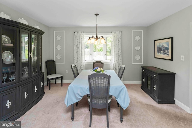 125 Christine Dr, Downingtown, PA 19335 - dining space featuring a chandelier and light colored carpet