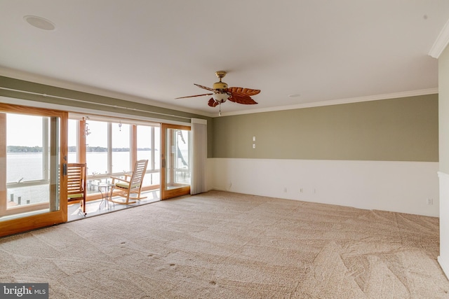 4534 Todd Pt, Sparrows Point, MD 21219 - carpeted spare room with crown molding, a water view, and ceiling fan
