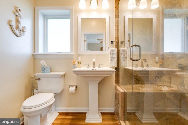 4534 Todd Pt, Sparrows Point, MD 21219 - full bath with a shower stall and wood finished floors