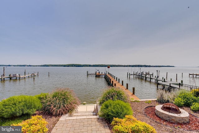 4534 Todd Pt, Sparrows Point, MD 21219 - dock area featuring a water view, an outdoor fire pit, and boat lift