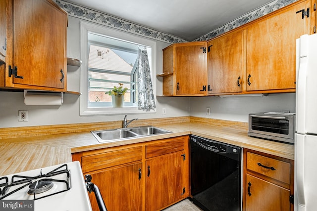 73 Duncan Ln, Springfield, PA 19064 - kitchen featuring dishwasher, freestanding refrigerator, light countertops, gas range oven, and open shelves