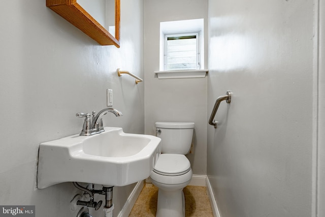 73 Duncan Ln, Springfield, PA 19064 - half bathroom with toilet and tile patterned flooring
