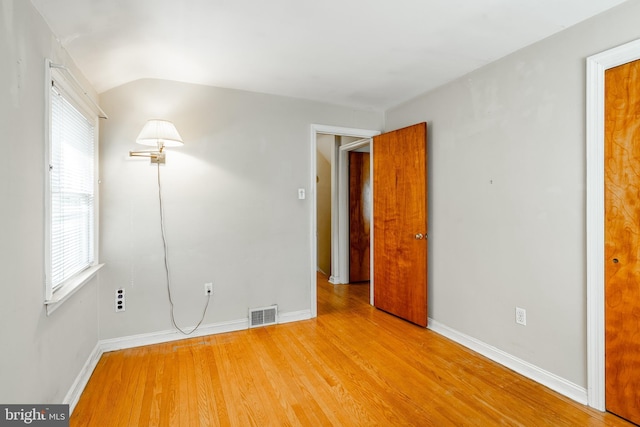 73 Duncan Ln, Springfield, PA 19064 - unfurnished bedroom featuring wood finished floors and vaulted ceiling
