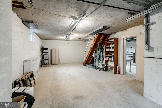73 Duncan Ln, Springfield, PA 19064 - below grade area featuring concrete block wall and stairs