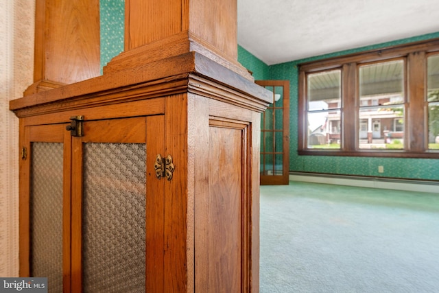 505 S Main St, Red Lion, PA 17356 - detailed view of a baseboard radiator, carpet, and wallpapered walls