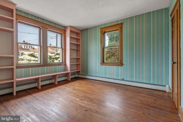 505 S Main St, Red Lion, PA 17356 - empty room featuring wallpapered walls and hardwood / wood-style floors