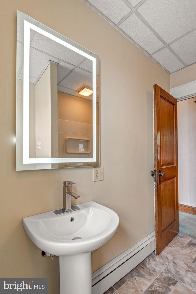 505 S Main St, Red Lion, PA 17356 - bathroom featuring baseboard heating and a drop ceiling