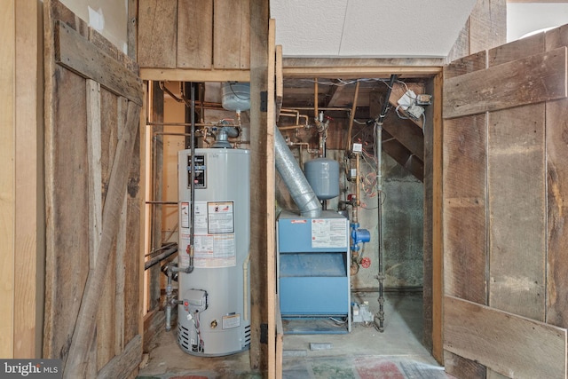 505 S Main St, Red Lion, PA 17356 - utility room featuring water heater and a heating unit