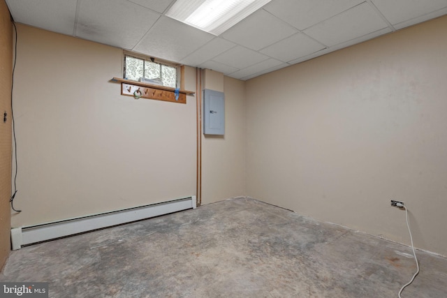 505 S Main St, Red Lion, PA 17356 - basement featuring a baseboard heating unit, electric panel, and a drop ceiling