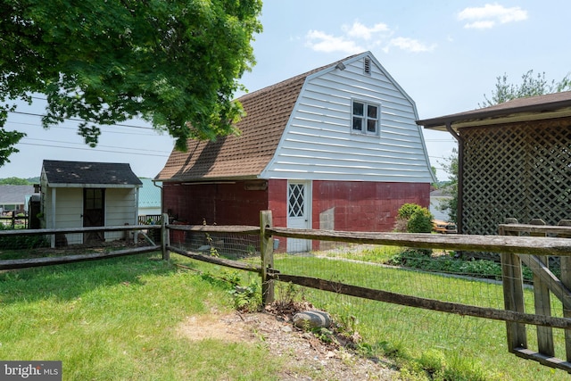505 S Main St, Red Lion, PA 17356 - view of property exterior featuring a gambrel roof, a barn, an outdoor structure, and a shingled roof