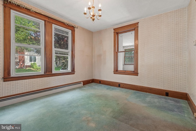 505 S Main St, Red Lion, PA 17356 - carpeted spare room featuring a baseboard heating unit, a chandelier, and wallpapered walls