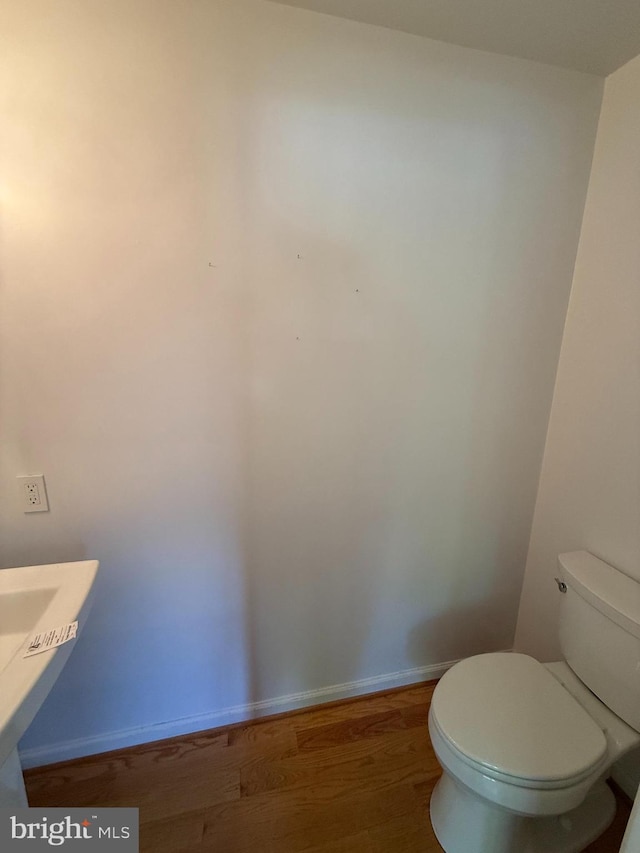 2133 Freda Dr, Vienna, VA 22181 - bathroom with wood finished floors and toilet