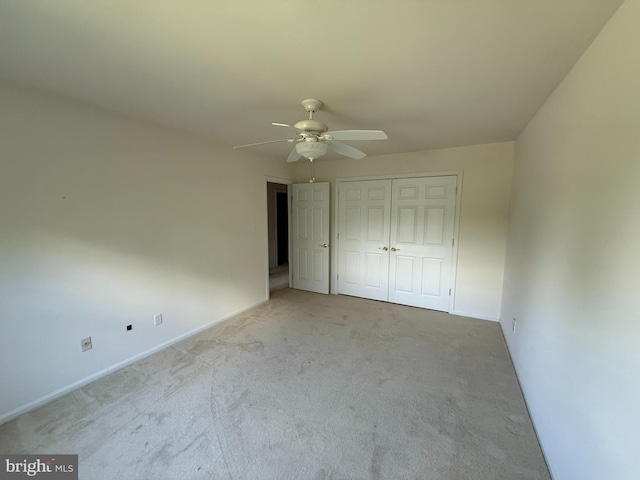 2133 Freda Dr, Vienna, VA 22181 - unfurnished bedroom with carpet, a closet, and ceiling fan