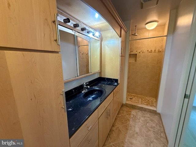 2133 Freda Dr, Vienna, VA 22181 - full bathroom featuring tiled shower, vanity, and tile patterned floors