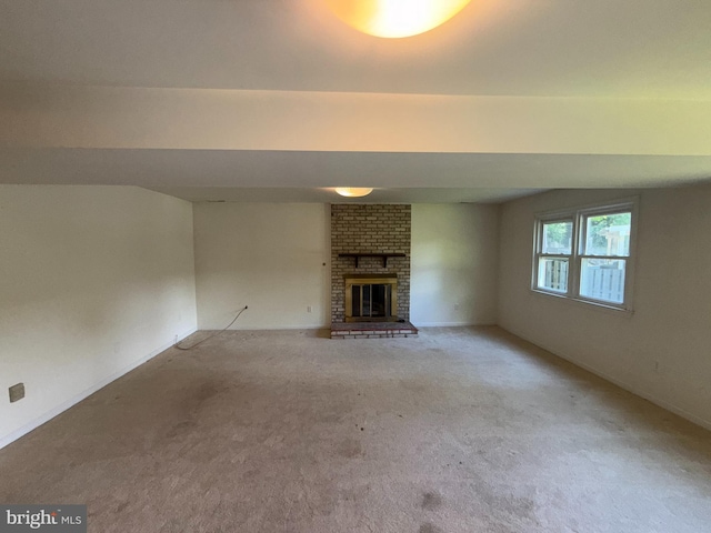2133 Freda Dr, Vienna, VA 22181 - unfurnished living room featuring light colored carpet and a brick fireplace