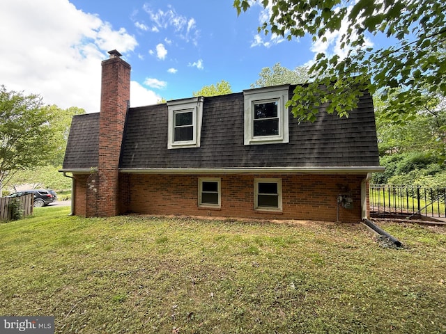 2133 Freda Dr, Vienna, VA 22181 - view of side of home featuring brick siding, a shingled roof, and a chimney