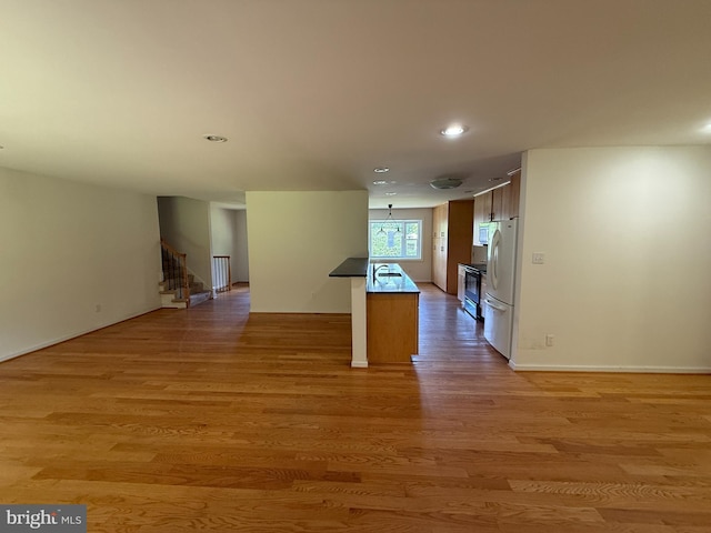 2133 Freda Dr, Vienna, VA 22181 - hall featuring recessed lighting, light wood finished floors, and stairs