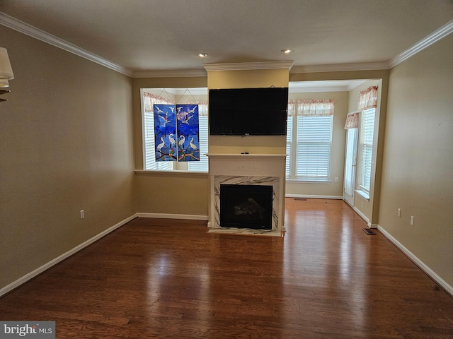 11 Alexandria Ct, Ocean Pines, MD 21811 - unfurnished living room featuring wood finished floors, ornamental molding, a premium fireplace, and recessed lighting