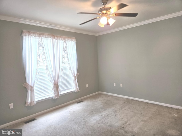 11 Alexandria Ct, Ocean Pines, MD 21811 - carpeted empty room featuring crown molding, plenty of natural light, and a ceiling fan