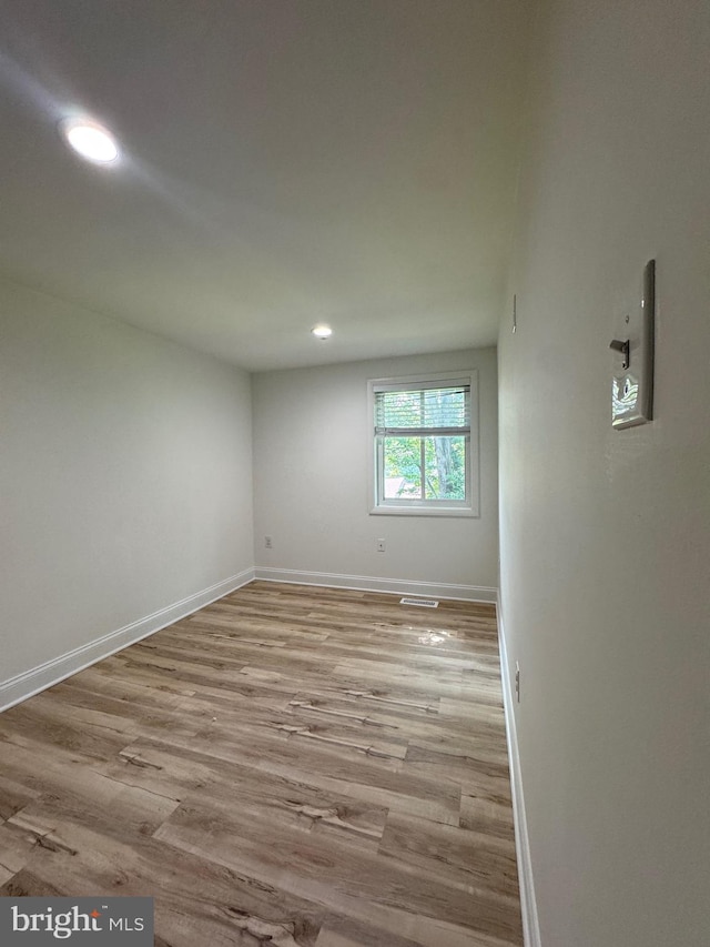 6529 Frietchie Row, Columbia, MD 21045 - empty room with recessed lighting and wood finished floors